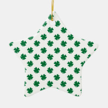 Four leaf clovers in green christmas ornaments