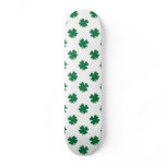 Four leaf clovers in green skateboard decks