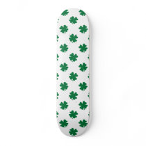 Four leaf clovers in green skateboard decks