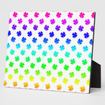 Four leaf clovers in rainbow display plaque