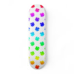 Four leaf clovers in rainbow skateboard deck