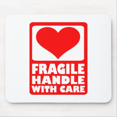 Fragile handle with care mousepad by Thinkdifferent