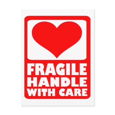 Fragile handle with care post card by Thinkdifferent