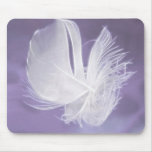 Free Falling feather on purple background Mousepad