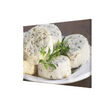 French goat cheese - chevre - with herbs on a canvas prints