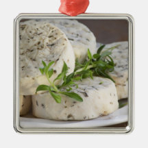 French goat cheese - chevre - with herbs on a christmas tree ornament