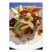 Fruit salad with ice cream.