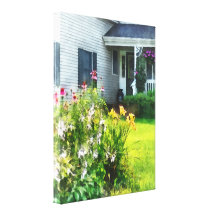 Garden with Coneflowers and Lilies Stretched Canvas Print