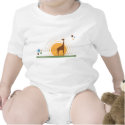 Giraffe at sunset t-shirts