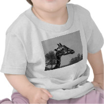 Giraffe head with plants and sky photograph tees