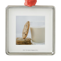 Glass of milk and cookies, close-up christmas tree ornaments