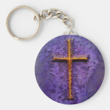 Gold cross on purple key chain
