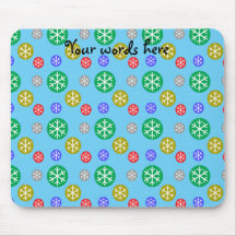 Gold silver red green snowflakes on blue mousepad