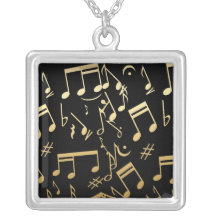 Golden musical notes on Black background Necklace