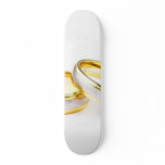Golden Wedding Rings On White Background skateboards