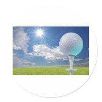 golf ball on a tee with grass sticker