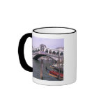 Gondolas and tourists near the Rialto Bridge mugs