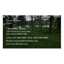 Grassy ground with trees and water business card