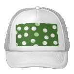 Green and white spotty pattern. hats