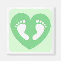 Green baby feet or footprints in heart magnet
