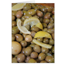Green olives and pieces of lemon greeting card