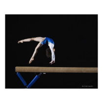 Gymnast (9-10) flipping on balance beam, side posters