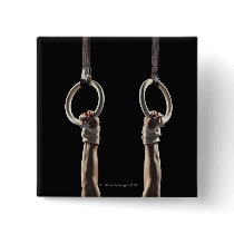 Gymnast swinging from rings 2 pins
