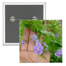 Hand, purple flowers, leaves button