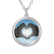 Hands in Heart Shape Silhouette on Blue Sky Jewelry