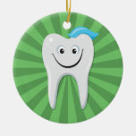 Happy cartoon tooth on a green background ornament