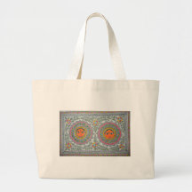 has a "sun" motif in "madhubani painting" style. tote bags