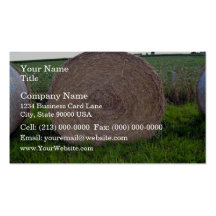 Hay bale rolls in a green field business card templates