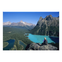Hiker overlooking turquoise-coloured Lake Photograph