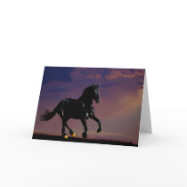 Horse silhouette galloping free at sunset greeting card