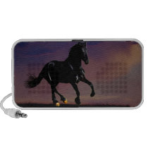 Horse silhouette galloping free at sunset laptop speakers