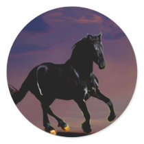 Horse silhouette galloping free at sunset round sticker