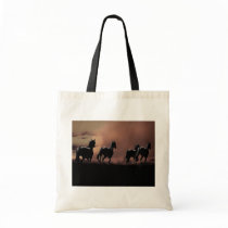 Horses running wild at sunset bags