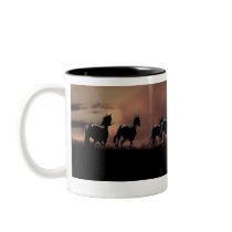 Horses running wild at sunset coffee mug