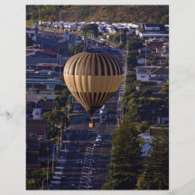 Hot Air Balloon flying over the city Flyers