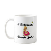 i believe in boob jobs mugs