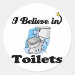 i believe in toilets round stickers