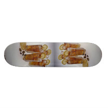 Iced tea in glass tumbler with lemon slice skateboard deck