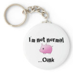 "I'm not normal" badge Key Chains