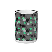 Impression florale vert clair, blanche et noire tasse