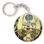 In the Driver's Seat of an Antique Yellow Tractor keychains