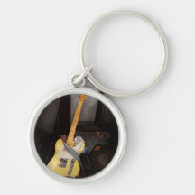 Instrument - guitare - jouant dans une bande porte-clefs