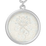 intricate art nouveau pine cone art necklaces