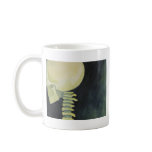 iridescent glowing skull and spinal cord coffee mugs