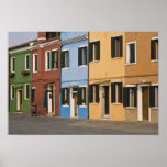 Italy, Burano. Colourful row of homes and empty