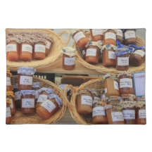 Jars with marmelade on a market in the Provence Place Mat